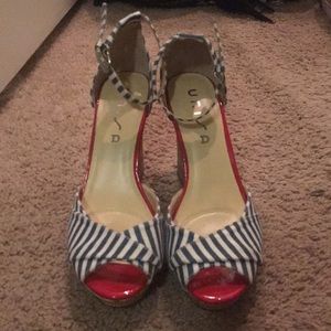 These beautiful wedges are pre-loved and are in great condition!